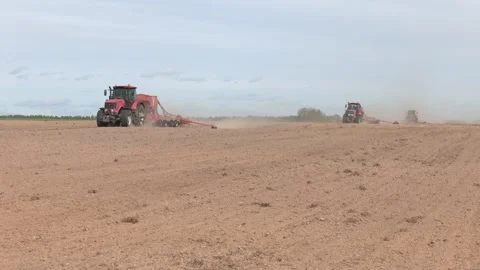 Three Tractors in the Field Seeding, Sowing Crops at Field Stock Footage 281914176