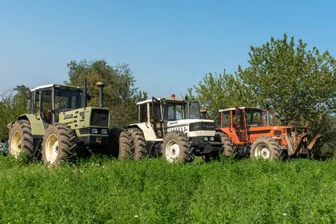 Three tractors. Same galaxy 170. Hurlimann h 6170 t. same Lamborghini 1706. Stock Photos