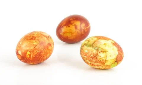 Three traditional painted Easter eggs on the bright background Stock Photos