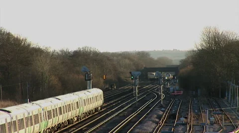Three Trains Passing at Sunset 스톡 동영상 45531588
