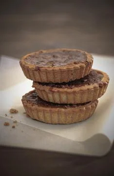 Three treacle tarts Stock Photos
