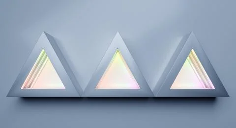 Three triangles creating light and shadow effects on a wall Stock Photos