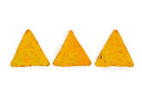 Three triangular tortillas in a row on a white background. Flat lay. Stock Photos