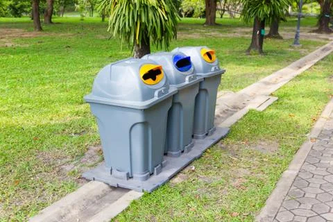 Three type recycling bin for each type of waste in the public park Stock Photos