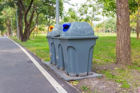 Three type recycling bin for each type of waste in the public park Stock Photos