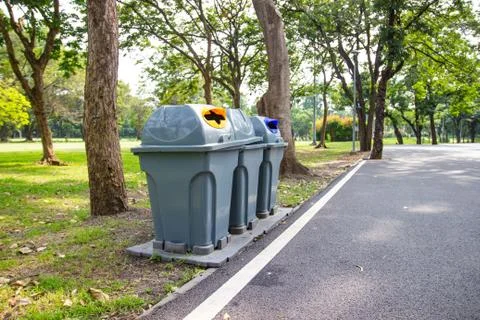 Three type recycling bin for each type of waste in the public park Stock Photos