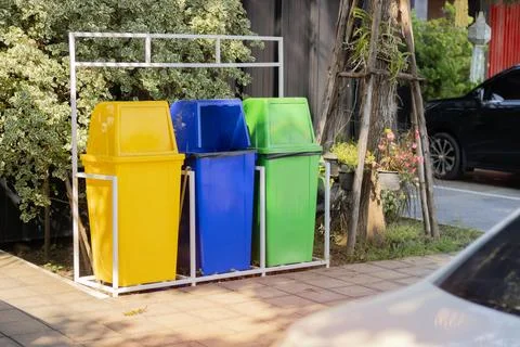 Three type recycling bin for each type of waste setting on public park. Stock Photos