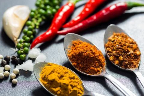 Three type of spices and herb on black stone background,selective focus Stock Photos