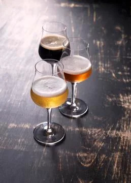 Three types of beer in glasses Stock Photos