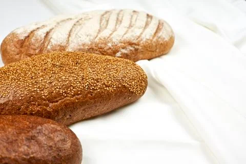 Three types of bread on white Stock Photos