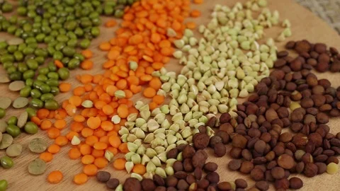 Three types of cereals and three types of lentils Stock Footage 123567937