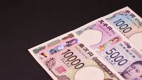 Three types of Japanese banknotes, rotating Stock Footage 311741666