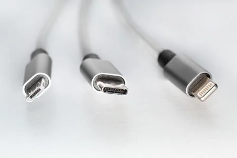 Three types of peripheral  cables connectors for charging or data. Concept EU Stock Photos