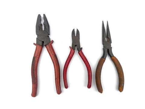 Three types of pliers in various designs and colors. Stock Photos