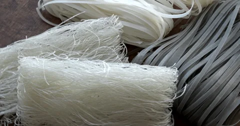 Three types of uncooked rice noodles. Stock Footage 279173789