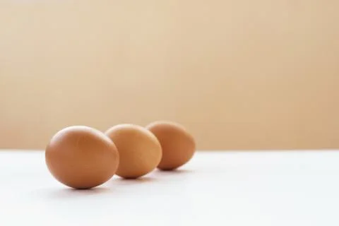 Three unpainted eggs Stock Photos