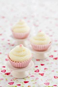 Three vanilla cupcakes Stock-Fotos