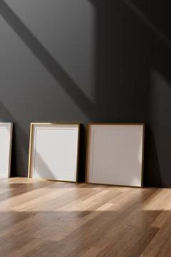 Three vertical white frame mockup, golden frame on black wall, 3d illustratio 库存插图