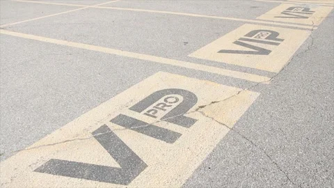 Three vip pro writing caption text parking spaces spots next to each other Stock Footage 250276384