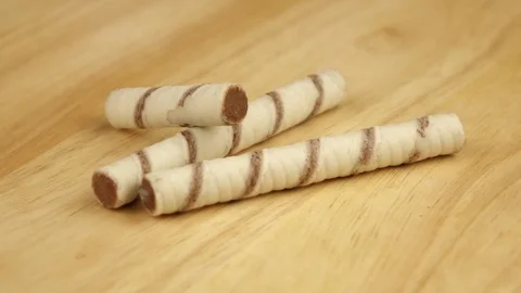 Three wafer tubes rotate 360 degrees on a wooden stand Stock Footage 119284752