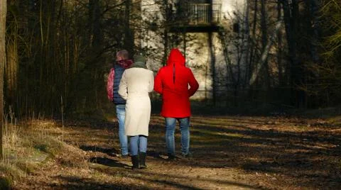 Three on a walk. Stock Photos
