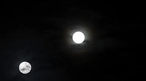 Three wandering moons Stock Footage 32036913