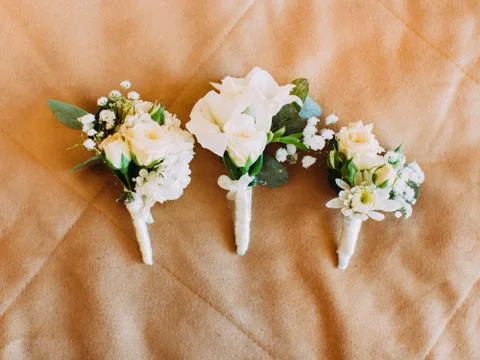 Three wedding mini-bouquets consisted of white roses Stock Photos