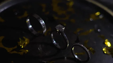 Three Wedding rings of decoration. Stock Footage 156399723