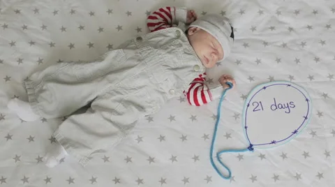 A three-week old boy asleep Stock Footage 67561235