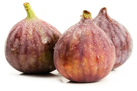 Three wet figs Stock Photos