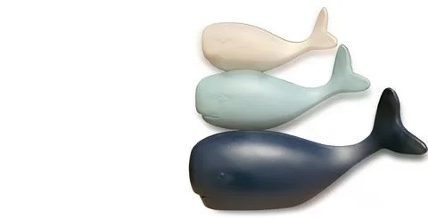Three Whale Decorative Objects Isolated on White Background Foto stock