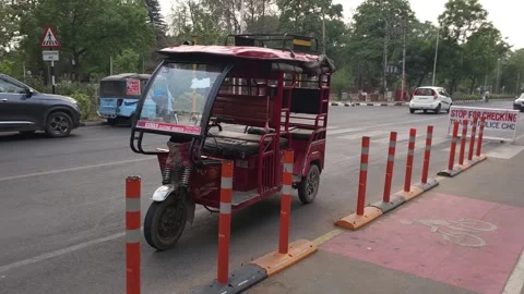 Three Wheeler Electric Rickshaw on the roads of Chandigarh. Plenty of them .. Stock Footage 283388820