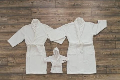 Three white Bathrobe Stock Photos