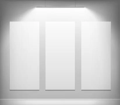 Three white canvas hanging on the wall. Ilustración de archivo