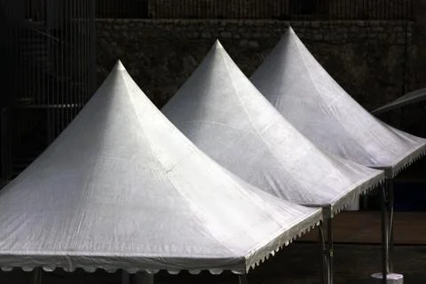 Three white cone canvas roofs. Antibes, Cote d'Azur, France Stock Photos
