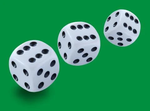 Three white dices of different size thrown in a craps game, yatzee or any Stock Photos
