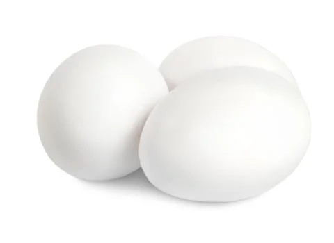 Three white eggs Stock Photos