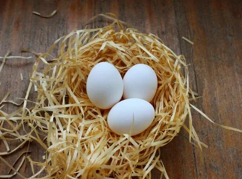 Three white eggs Stock Photos