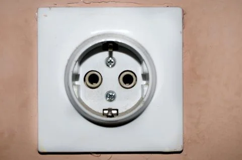 Three white European 220V power socket on green wall in Novi Sad, Serbia Stock Photos