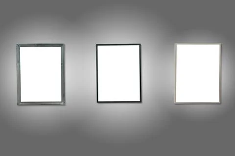 Three white isolated wooden frames Foto stock