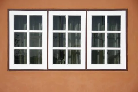 Three white panel front of house Stock Photos