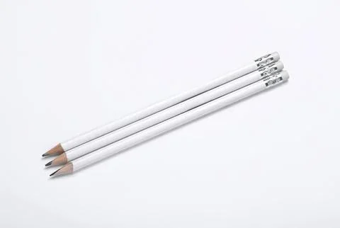 Three white pencils with erasers on a plain background Stock Photos