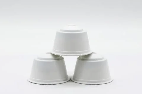 Three white plastic pods arranged in a triangle Stock Photos