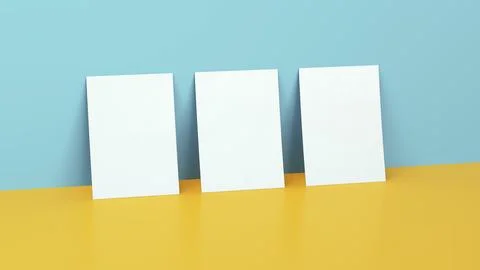 Three White Posters Mockups on a Blue and Yellow Background With Reflection. Illustrazione stock