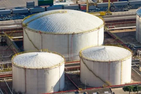 Three white storage tanks Stock Photos