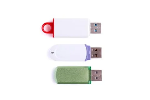 Three white USB flash drives isolated on white background. Stock Photos