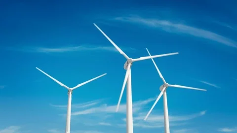 Three white wind turbine Generating electricity on blue sky Stock Footage 71976563