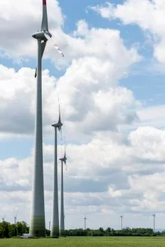 Three wind power engines in wind park Stock Photos