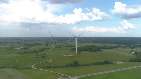 Three wind power turbines. Cloudy sky. Aerial drone footage HD Stock Footage 133001322