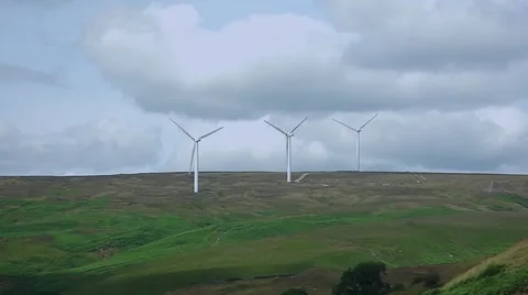 Three Wind Turbines on horizon Stock Footage 43042737